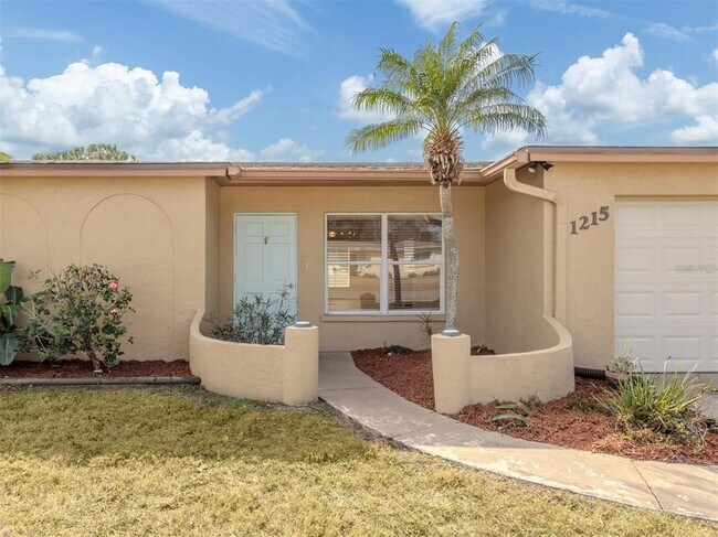 Building Photo - 1215 Mango Ave