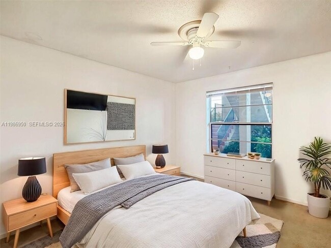 Building Photo - 6090 N Sabal Palm Blvd