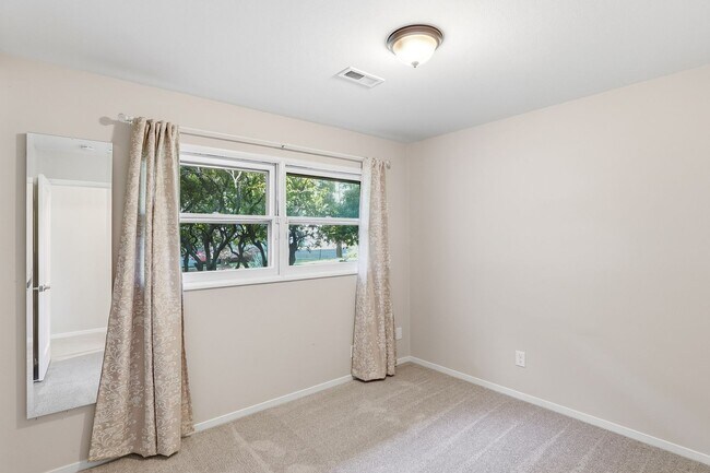 Building Photo - Bright & Comfortable Home with Private Patio and Covered Parking