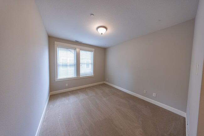 Building Photo - 2 Creeks Condominiums - Gated Community on...