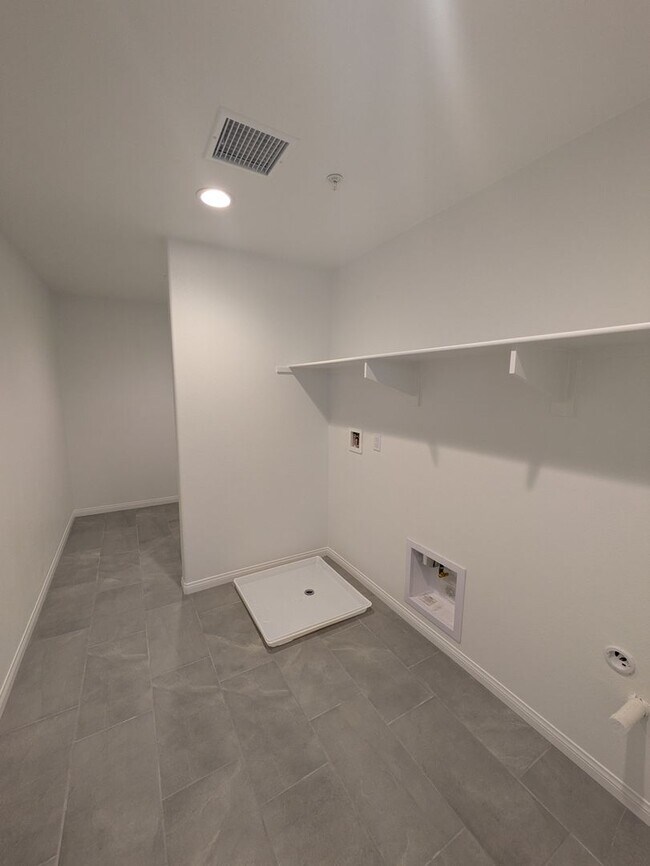 Building Photo - Brand New Home in a Resort-Style Gated Com...