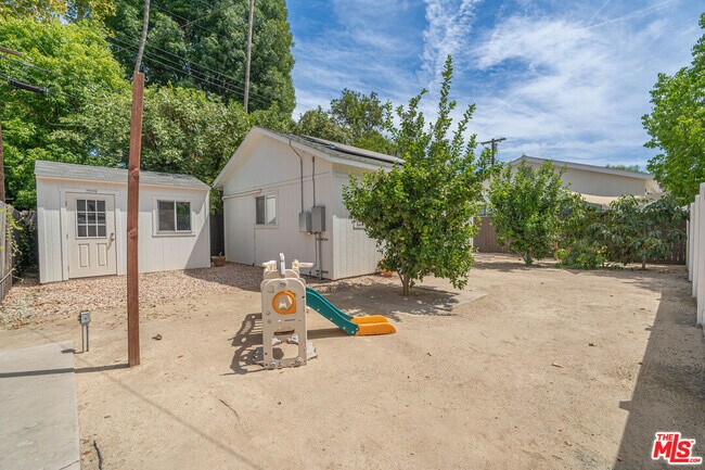 Building Photo - 7044 Garden Grove Ave