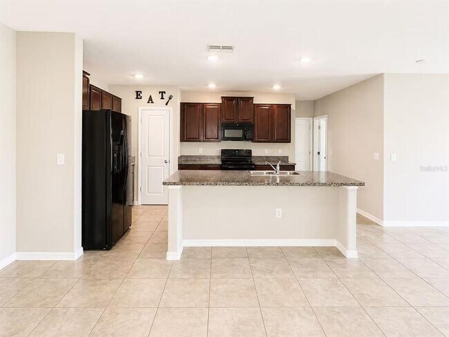 Building Photo - 7406 Rosy Periwinkle Ct