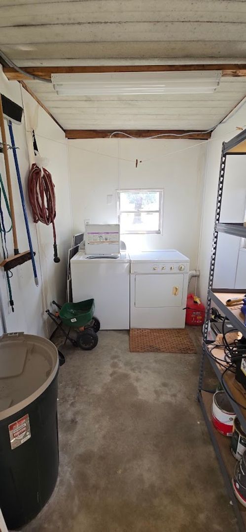 Building Photo - 2 bed 2 baths with carport