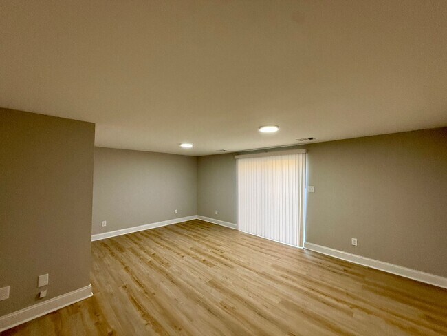Building Photo - New Everything 4BR Townhome with Private Lower Level Suite | Stainless Kitchen | LVP + New Carpet...