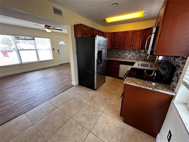 Building Photo - 8933 Narcissus Ave