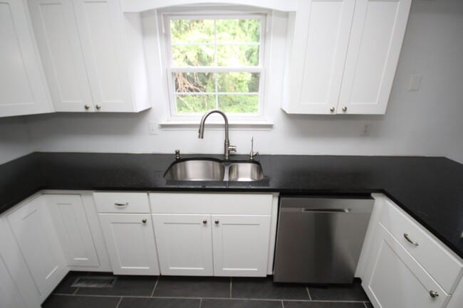 Building Photo - *Coming Soon*  Upgraded End Unit Townhome ...