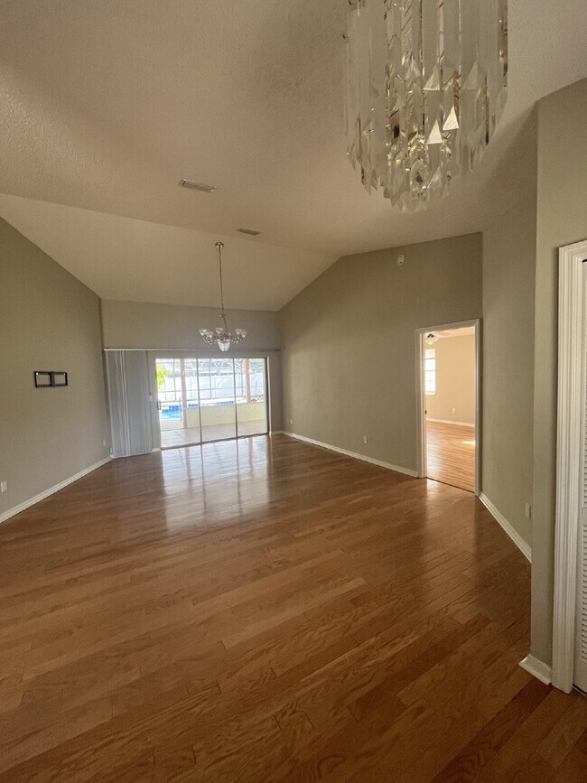 Building Photo - Spacious Pool Home in Desirable Palm Harbor – Pool Care Included
