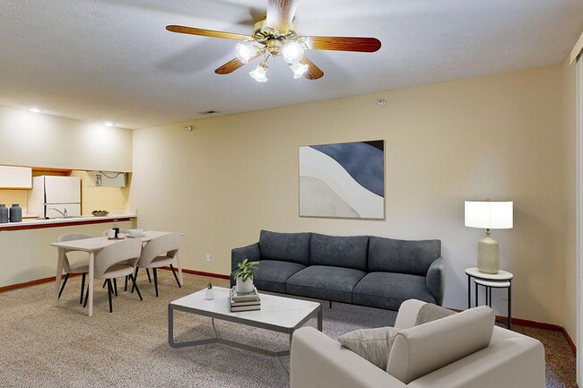 Enjoy open-concept layouts, where your dining area flows easily into a cozy, inviting living space. - Pine Lake Heights Apartments
