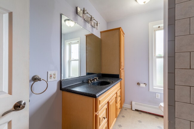 Bathroom located between office/extra bedroom and kitchen - 506 Washington St