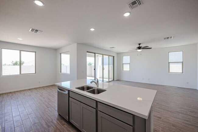 Building Photo - HOME IN LAVEEN! 4 BED 3.5 BA 3 CAR GARAGE!...