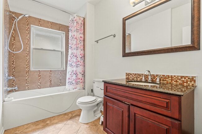 Building Photo - 7938 S Bennett Ave