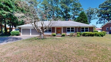 Building Photo - Charming 3 Bedroom Brick Ranch with Refurbished Original Woodwork