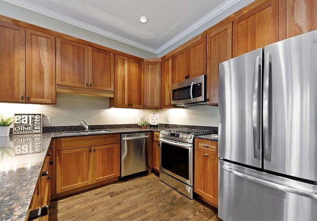 Building Photo - "Spacious 3-Bedroom Condo with Finished Ba...