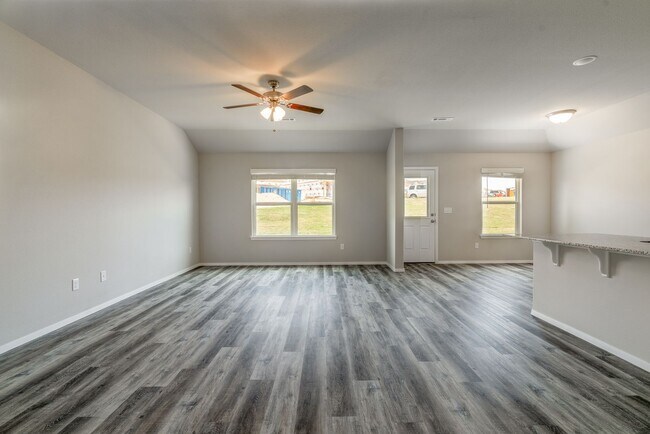 Building Photo - Like New 4-bedroom 2 bath Home in Lowell!!  Fenced Yard!