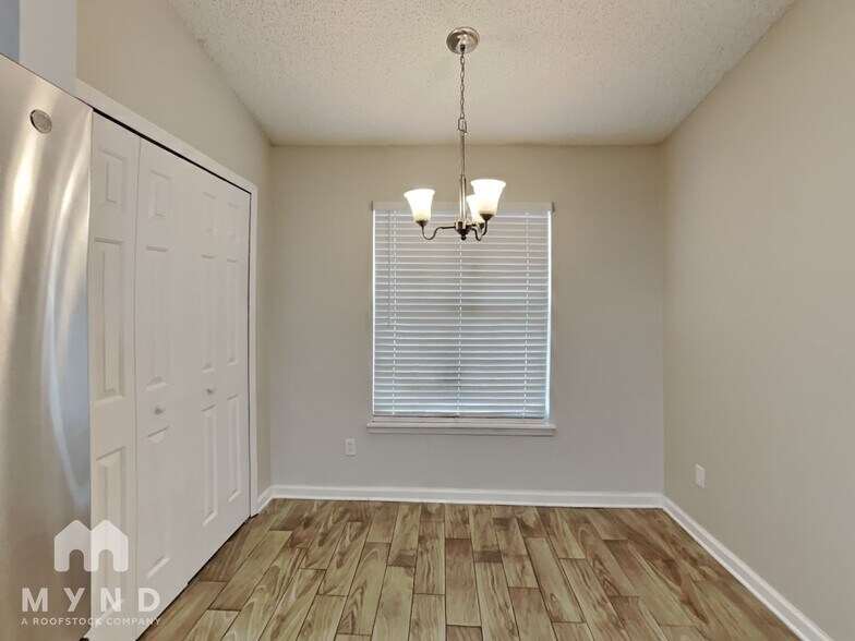 Building Photo - 7637 Invermere Blvd N