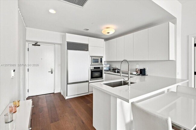 Building Photo - 6799 Collins Ave