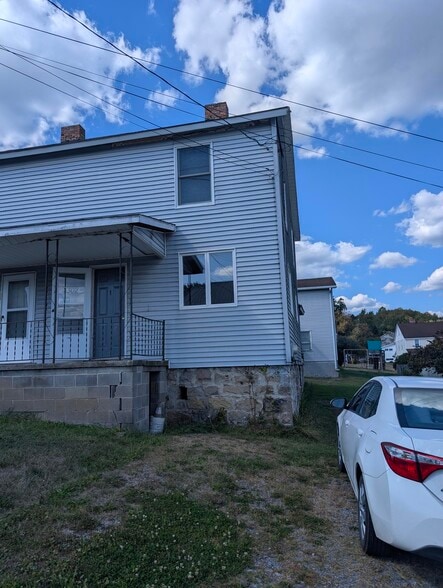 Front of unit with parking - 302 Jerome Ave