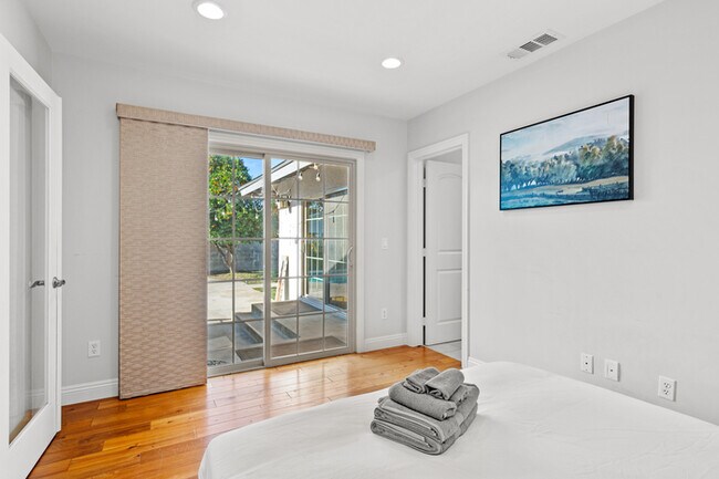 Building Photo - Luxury Estate with Sparkling Pool & Elegant Amenities