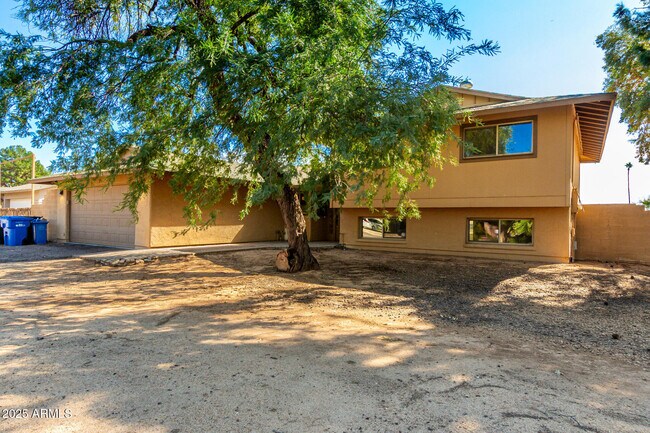 Building Photo - 5031 E Pershing Ave