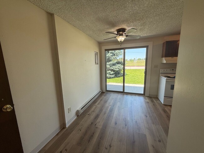 Building Photo - Two Bedroom, One and half bath townhome close to Regional West Medical Center.