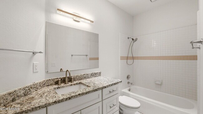 Building Photo - 8638 E Dahlia Dr