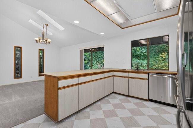 Building Photo - Mid-Century Gem with Hot Tub, Large Deck, and Bonus Rooms in Issaquah – 4 Bed, 3 Bath, 2,940 Sq Ft