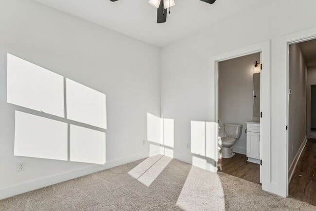 Building Photo - High-End 2BR Townhome | Rooftop Terrace + 2-Car Garage | 24-Unit Community