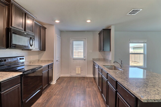 Building Photo - Move-In Ready 3-Bed Home with Solar Panels + Washer, Dryer & Refrigerator — Half Off Second Full ...