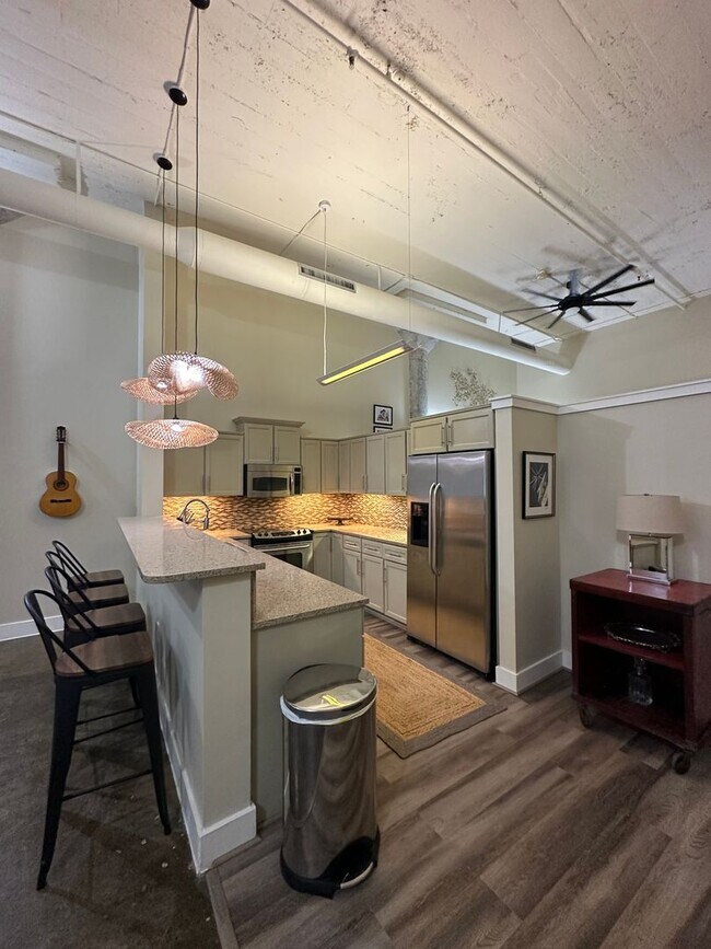 Building Photo - 1 BR/ 1BA at The Lofts with GATED GARAGE P...