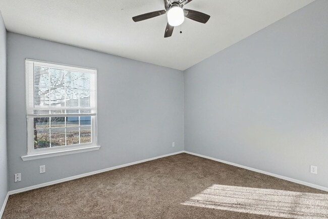 Building Photo - 3-Bed Home with Fireplace, Fenced Yard & Flexible Living Space