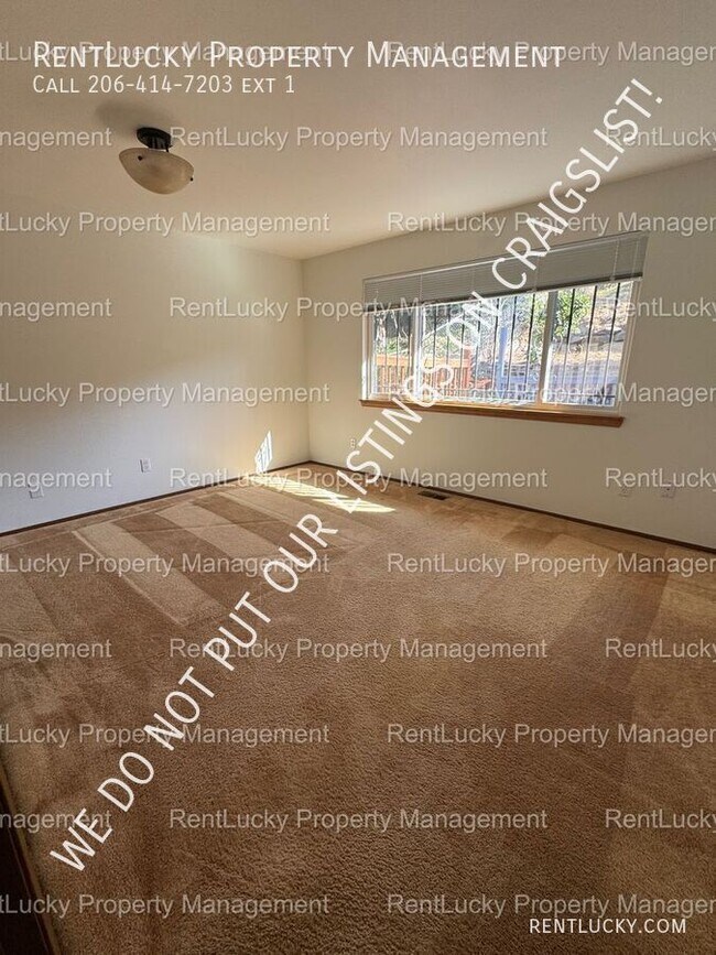 Building Photo - 6718 23rd Ave SW