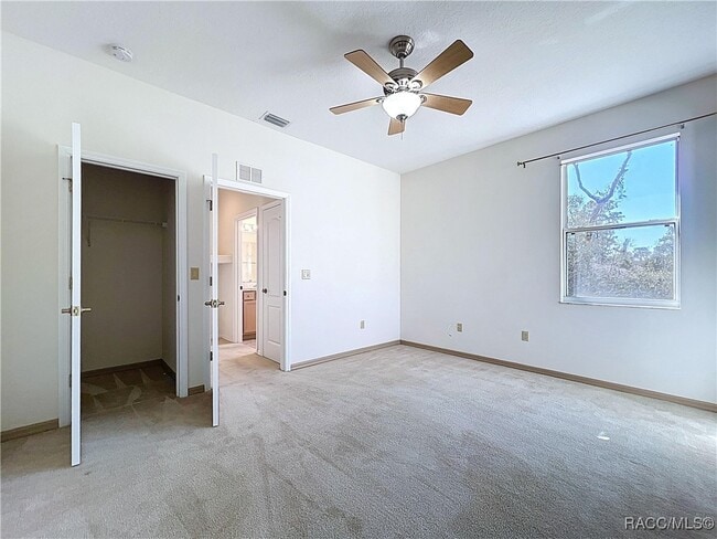 Building Photo - 5950 N Petunia Terrace