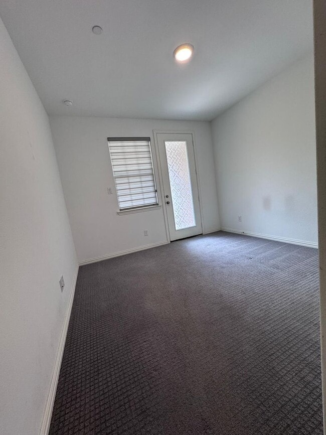 Building Photo - FULLY UPGRADED LUXURY TOWNHOME located in ...
