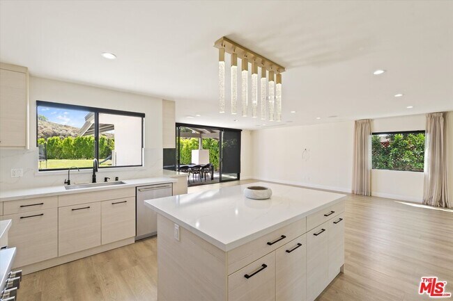 Building Photo - 11700 Woodley Ave