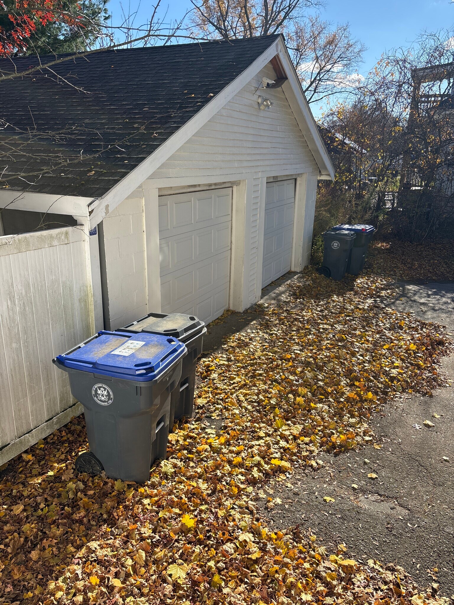 Garage and additional parking in driveway. - 27 Elm St