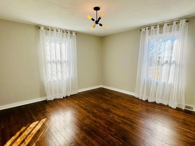 Building Photo - {8520} Charming Four Bedroom in Fantastic Location + Two Main Floor Bedrooms + Hardwood Floors + ...