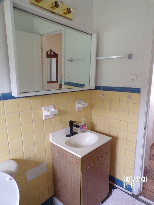 Building Photo - NEW listing-refinished hardwood floors, new laminate and paint throughout