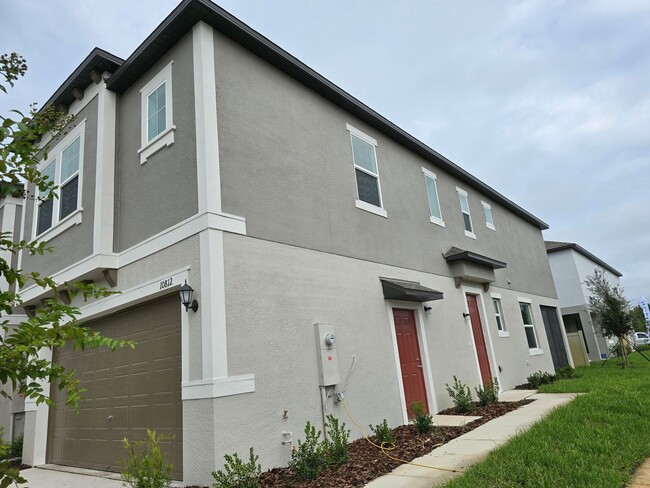 Building Photo - Brand New Corner Lot Townhome!