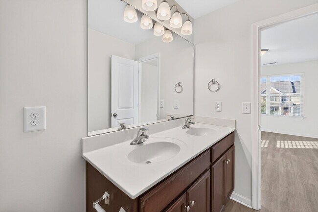 Building Photo - Expansive 4-bedroom, 3.5-bathroom single-family home boasts 3,150 sq. ft.