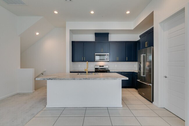 Building Photo - Stunning 4-Level Townhome in Inspirada | R...