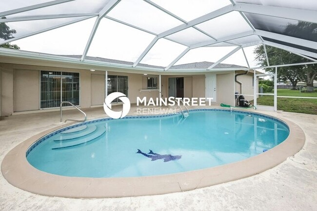 Building Photo - 3 Bedroom Pet-Friendly Home in CAPE CORAL, FL with Main Street Renewal