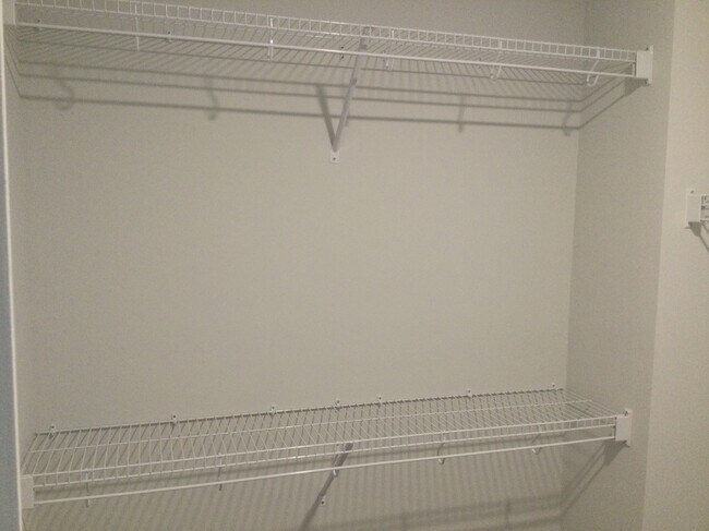 Master bedroom walk-in closet - 208 Hickory Plains Rd