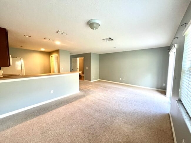Building Photo - MOVE IN MARCH! Charming 2 Beds 2.5 Bath Townhome! 2 MASTER SUITES! Attached one car garage!! Extr...