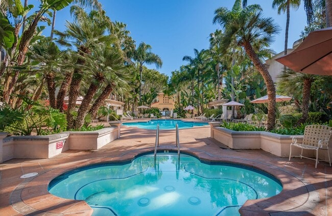 Building Photo - Total Quality Living! El Escorial Villas at East Beach~