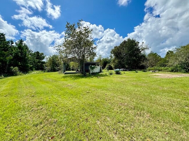 Building Photo - 6087 Woodard Ln