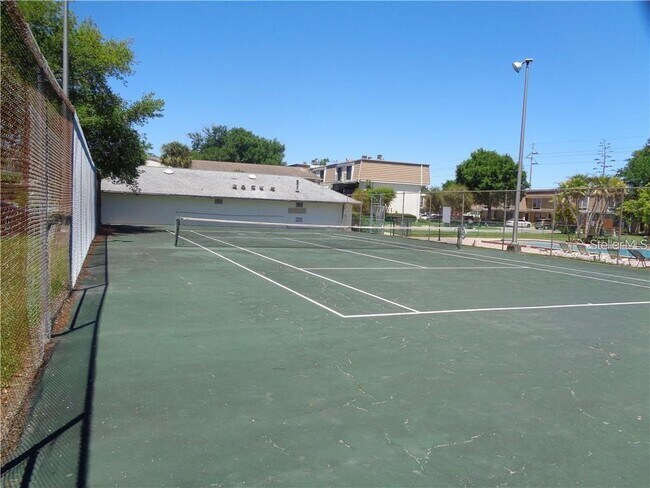 Building Photo - 5999 Village Cir N