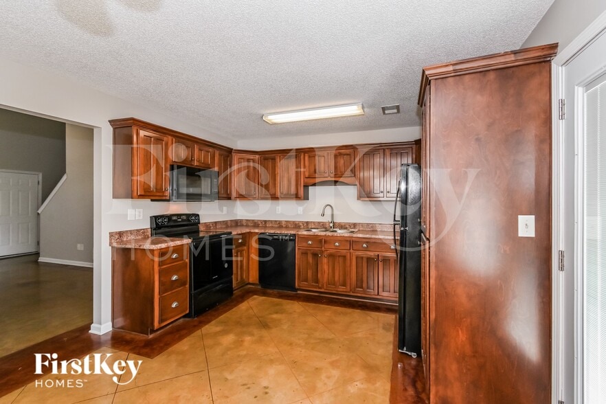 Building Photo - 9843 White Poplar Dr