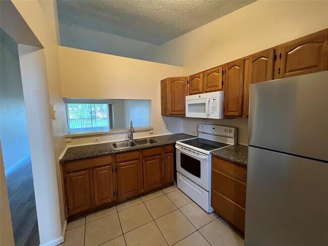 Building Photo - 2431 NW 56th Ave