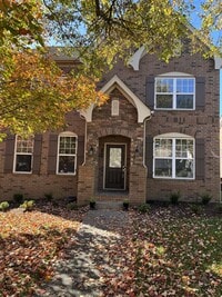Building Photo - "Charming 4-Bed Home with Guest Suite & Gr...